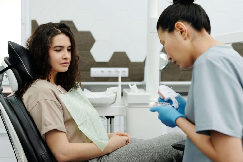 Relaxed patient seated comfortably in a bright dental treatment room at MK Dental Studio in Fulshear, TX