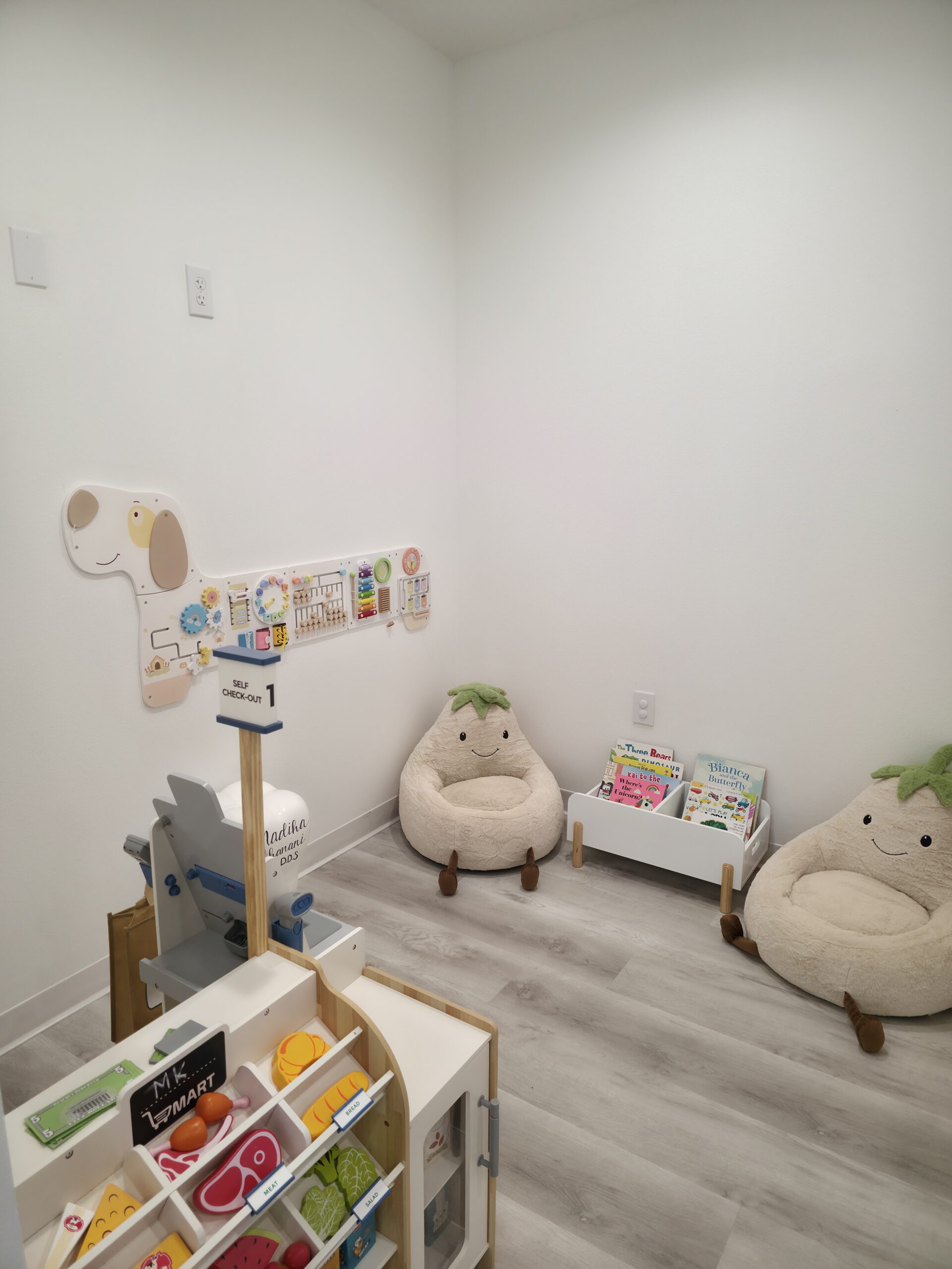 Kids play corner in the waiting area at MK Dental Studio in Fulshear, TX