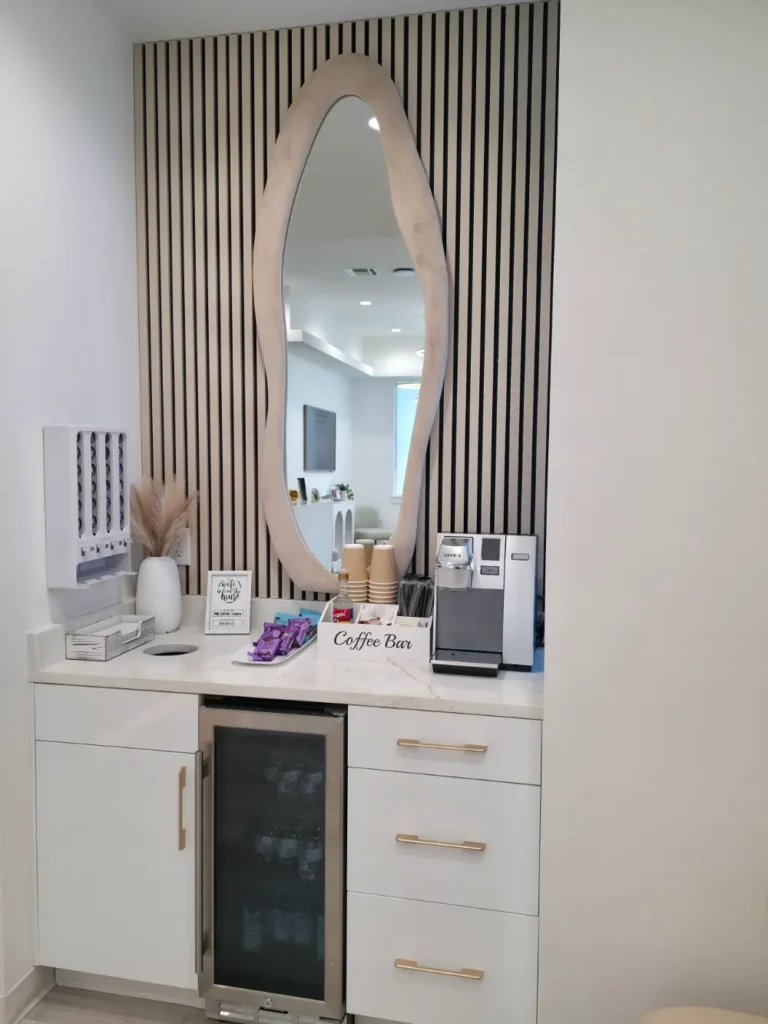Coffee bar in the lounge, one of our dental office amenities in Fulshear, TX